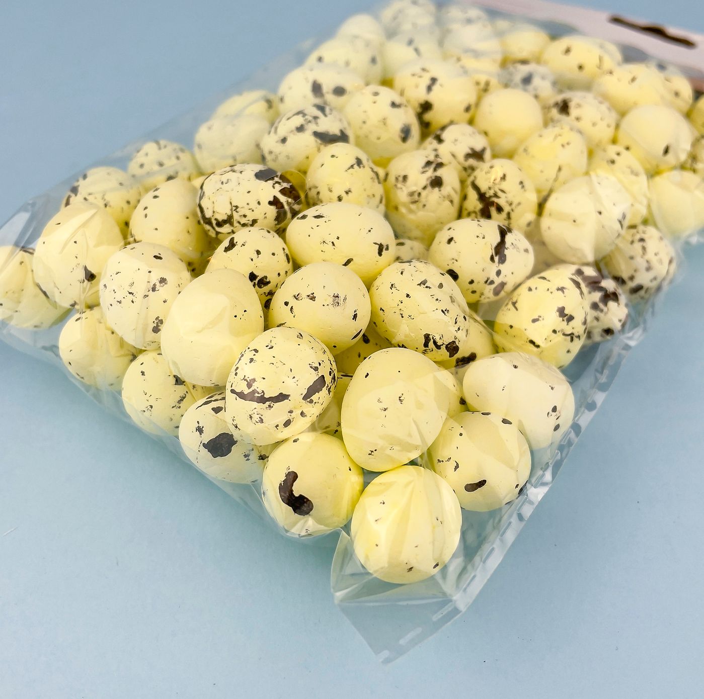 Великодні яйця для декору "перепелині" жовті дрібні, 1.5×2 см, 100 шт.